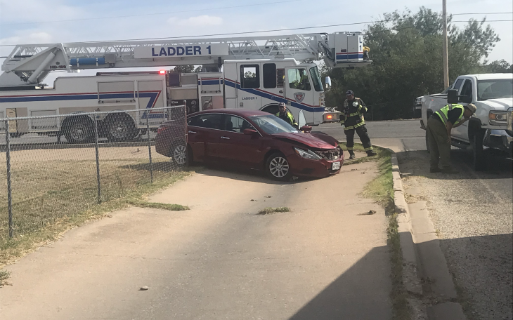 Two people were transported to the hospital by ambulance Thursday after a crash on Chadbourne Street sent a vehicle onto a sidewalk.