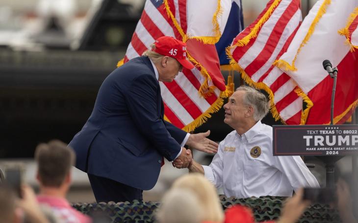 President Donald Trump greets and shakes hands with Gov. Greg Abbott in Edinburg on Nov. 19, 2023. Trump on Tuesday endorsed Abbott, who is seeking a fourth term as Texas governor.  Eddie Gaspar/The Texas Tribune