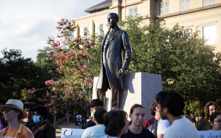 Texas A&amp;M University students gather around the statue of former university President Lawrence Sullivan Ross for a protest in defense of academic freedom on Sept. 22, 2025. Texas A&amp;M University System regents on Thursday will vote on a policy that would prohibit faculty from teaching &quot;race and gender ideology.&quot;