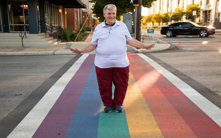 James Poindexter, Pride San Antonio Board Member, at the rainbow crosswalk in the city’s Pride Cultural Heritage District on Thursday. Poindexter helped organize the event where several community members, city officials, and leaders of LGBTQ+ and ally organizations rallied and signed a resolution urging the city to challenge Gov. Greg Abbott’s order to remove rainbow crosswalks throughout Texas.