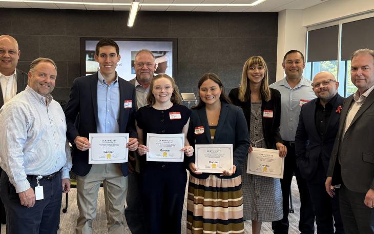 ASU Team (with certificates, L-R) Andres Ybarra, Katelyn St. John, Tatiana Alvarez and Ava James; Dr. Jeremy St. John (back row middle) and the contest judges. 