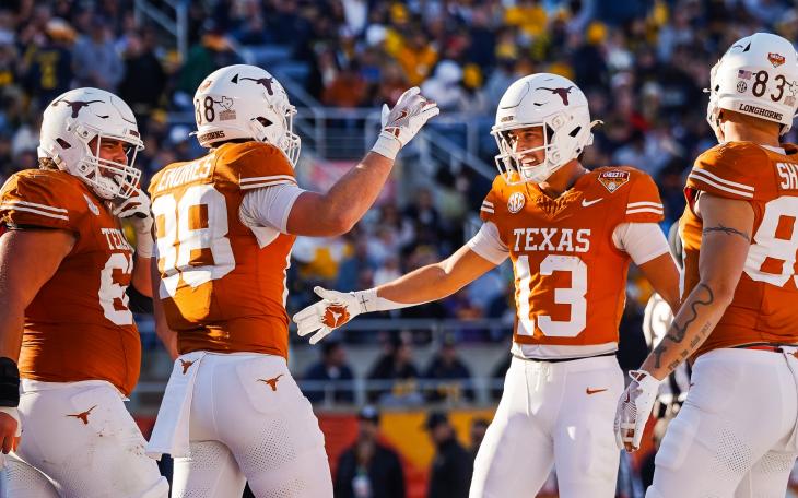 The Texas Longhorns celebrate during their Citrus Bowl win over Michigan on Wednesday, Dec. 31, 2025.