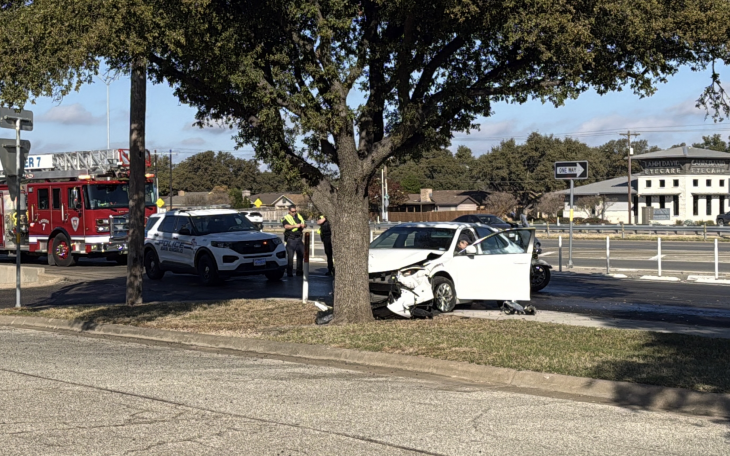 White Toyota Camry strikes a tree in crash