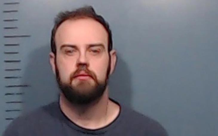 Lance Mosley, the band director at Mann STEAM Academy, was arrested Thursday and charged with possession of child pornography.