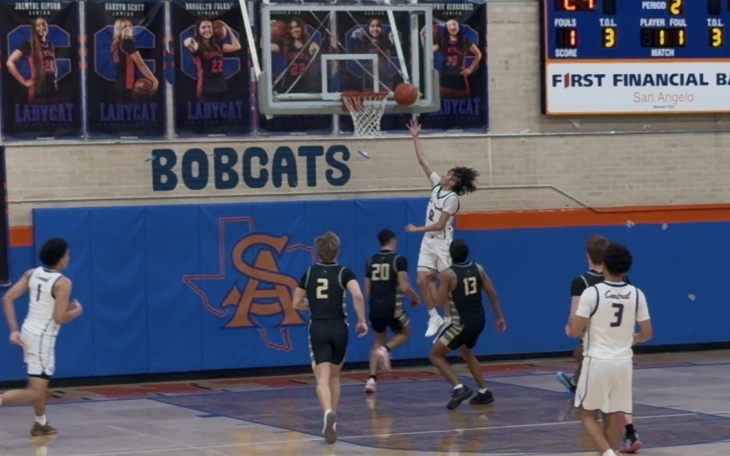 Central's Ean McNeill goes up for 2 points
