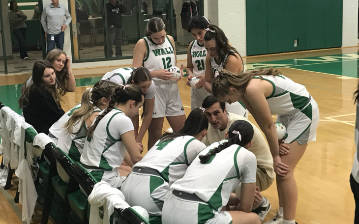 Wall girls basketball coach Silas Crisler talks to his team before their game against Jim ned on Tuesday, Jan. 20, 2026.