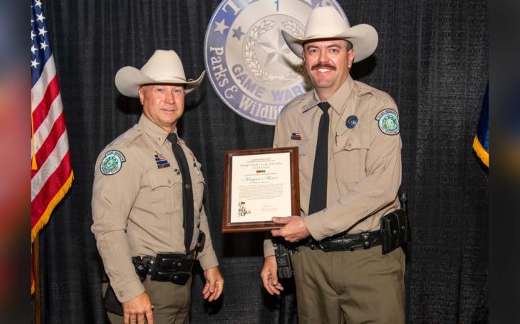 Runnels County Game Warden Keegan Moore honored with Director's Life Saving Citation for applying a tourniquet that saved a crash victim's life.
