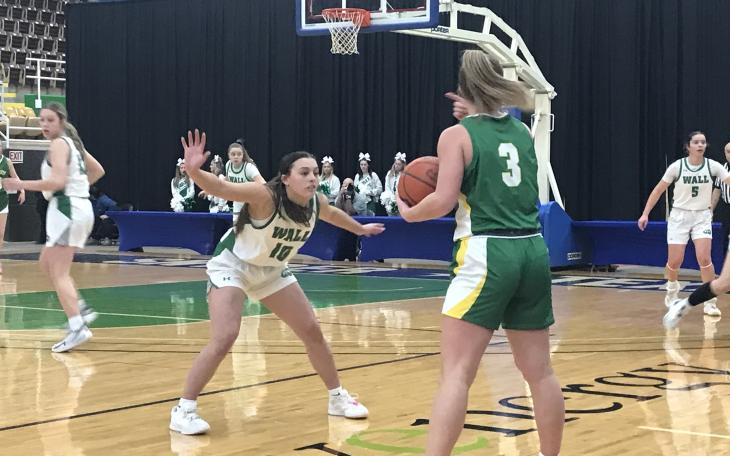 Wall's Kylee Holik guards Idalou's Preslie Wall during their regional semifinal game Tuesday in Snyder.