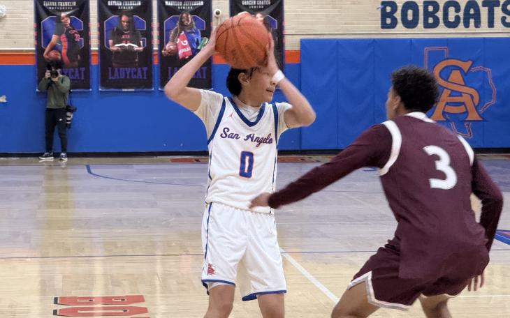 Central Bobcats' Ean McNeill in action against Midland Legacy