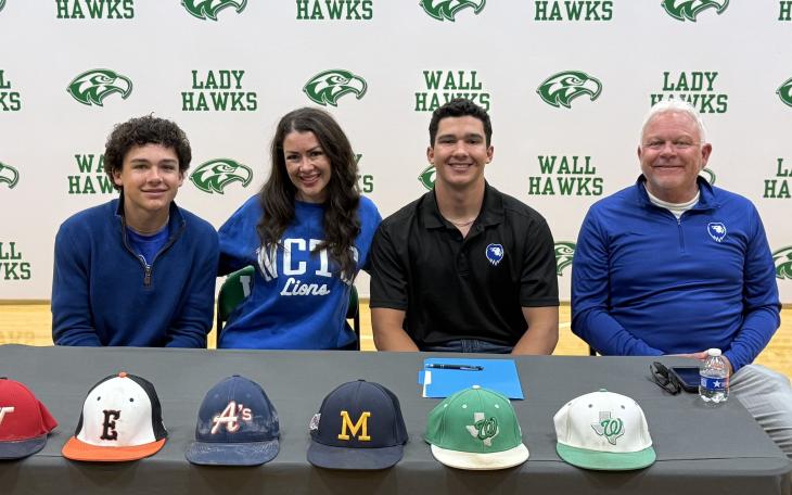 Wall Hawks' Gage Reichenau and his family at his signing day at Wall High School