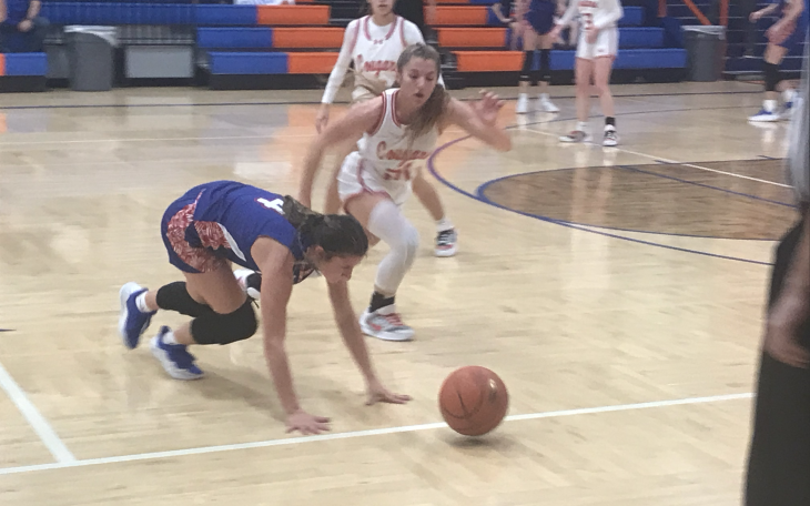 Christoval's Sophia Nemec and Coleman's Savannah Hurtado hustle toward a loose ball in their playoff game Monday, Feb. 16, 2026.