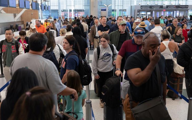 Travelers wait for hours in long TSA lines at the George Bush Intercontinental Airport in Houston on March 25, 2026. REUTERS/Antranik Tavitian