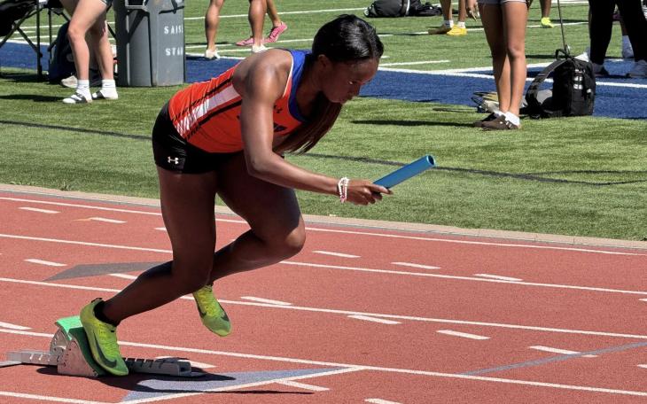 A San Angelo Central athletes takes off with the baton during the San Angelo Relays on Friday, March 13, 2026.