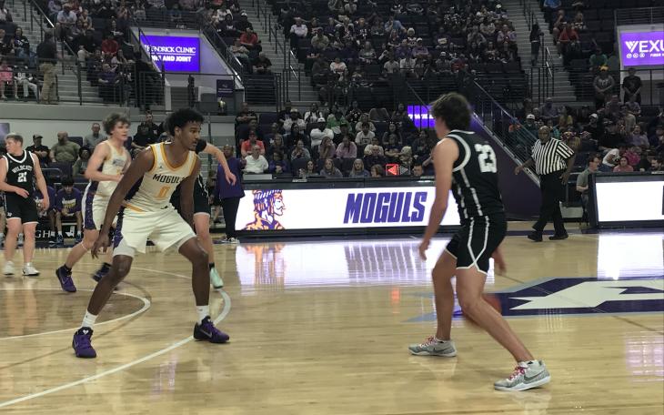 Water Valley's Branson Lacy dribbles against the defense of Munday's Jariyis Williams in their regional final game Friday, March 6, 2026.