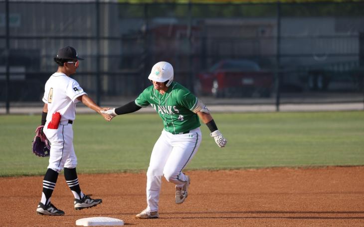 Abilene High second baseman Xavier De La Cruz congratulates Wall's Reid Ballard after his home run Friday, April 10, 2026.
