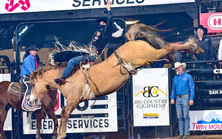 Texas cowboy Leighton Berry scored a 92 on Saturday to take the lead in bareback riding at the San Angelo Rodeo.