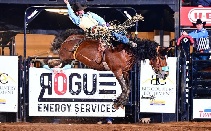 Australia's Toby Deudney had an electrifying ride to score 93 points and win the bareback title Saturday at the San Angelo Rodeo's Cinch Chute-Out.