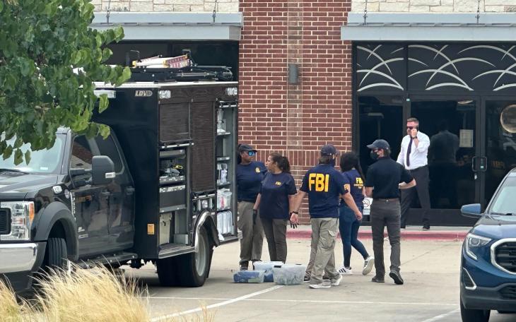 Law enforcement responds to the scene of a shooting on Tuesday, May 5, 2026, at K Towne Plaza in Carrollton.
