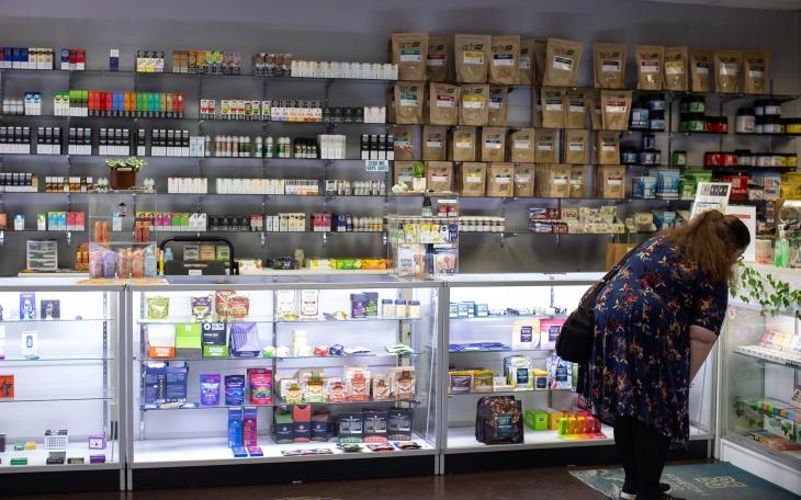 A customer browses products at Austin Vape &amp; Smoke in Austin.
