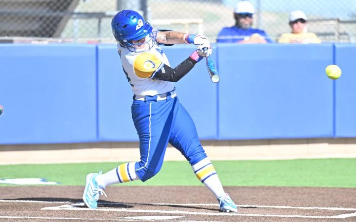 Angelo State's Tatiana Trotter swings during the 2026 softball season.