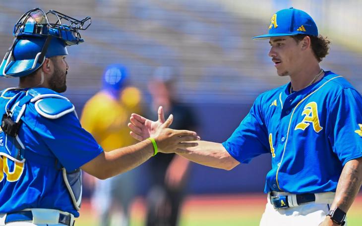 Angelo State's Chris Bernal (left) and Isaac Godard celebrate after a 12-2 win over Texas A&amp;M-Kingsville in the opening round of the LSC Tournament on Monday, May 4, 2026.