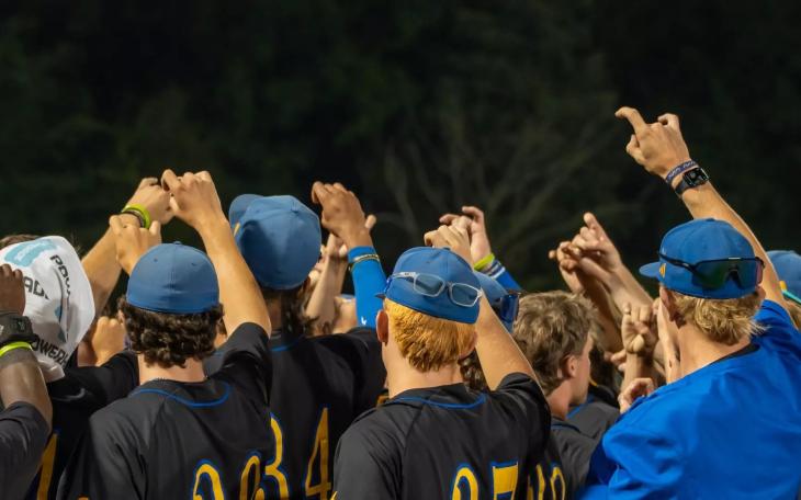The Angelo State baseball team huddles during the 2026 season.
