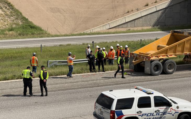 A road worker had his leg broken when he was backed over by a construction vehicle Tuesday morning on the Houston Harte Expressway.