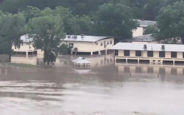 The Guadalupe River in Kerr County surged over its banks Thursday, July 16, 2026.