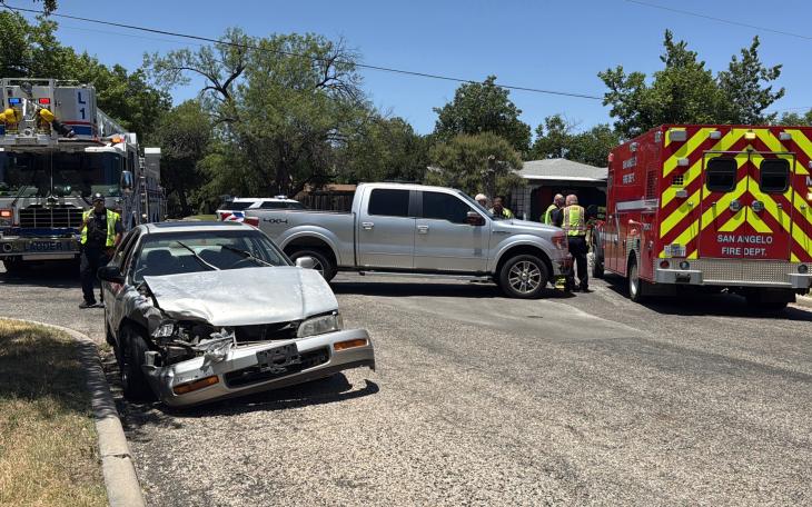 A woman was taken to the hospital Friday afternoon after a two-vehicle collision in a residential area.