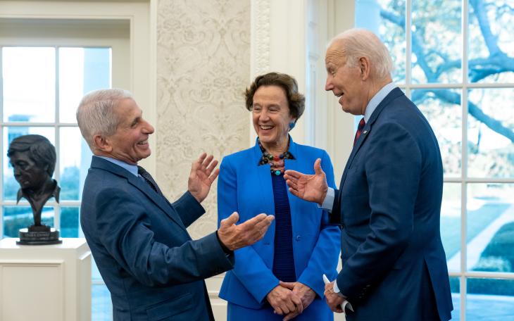 Dr. Anthony Fauci shares a laugh with President Joe Biden.