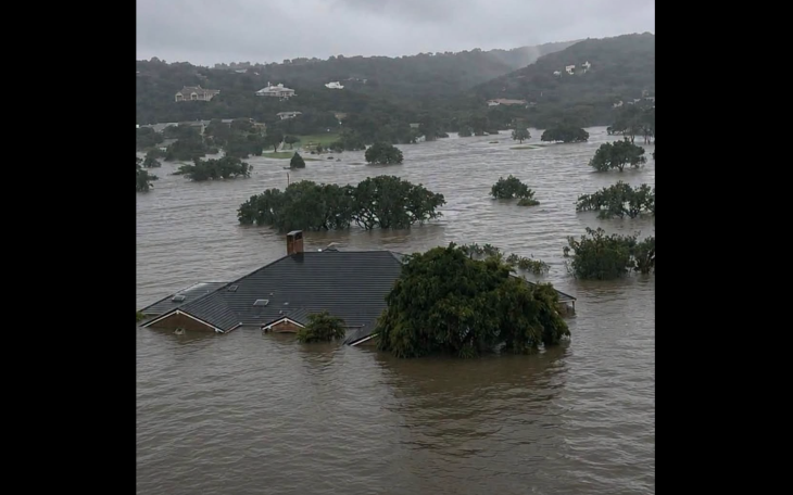 A house in shown under water after flooding near Boerne on July 16, 2026.