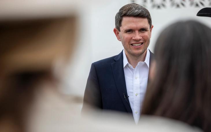 Democratic U.S. Senate nominee James Talarico talks to local officials after a campaign stop in Sanderson on July 13, 2026