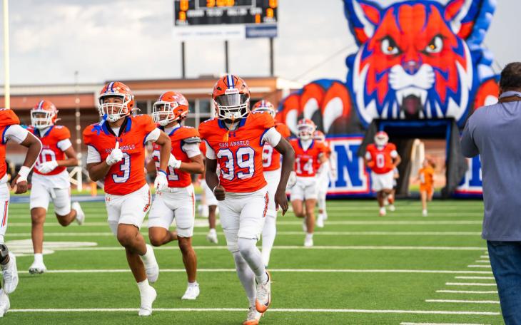The Central Bobcats run onto the field before their game against Abilene Cooper on Friday, Sept. 11, 2026.