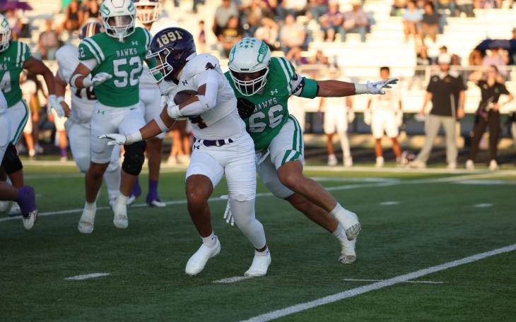 Wall's Gage Jacoby chases down Ozona's Kaleb Ramon during a game Friday, Sept. 18, 2026.