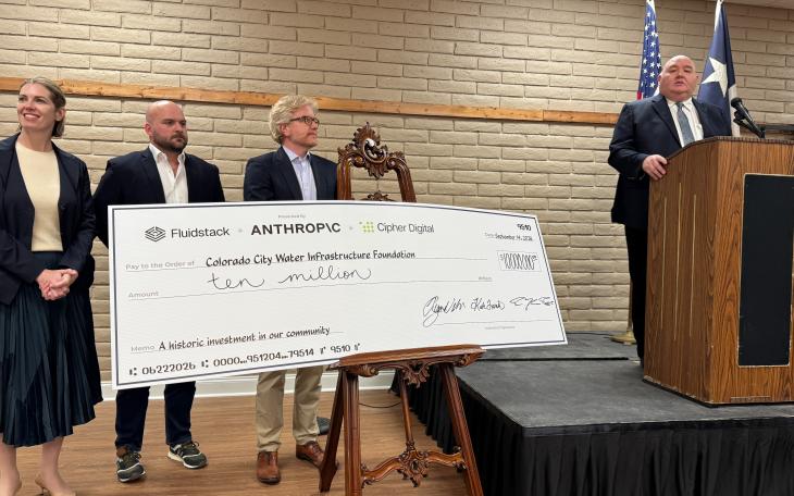 Colorado City Mayor Ruben Hurt is at the podium. To his right, from left to right, are Fluidstack's Kate Franco, Anthropic's Ryan Wilson, and Cipher Digital CEO Tyler Page. (LIVE! Photo/Joe Hyde)
