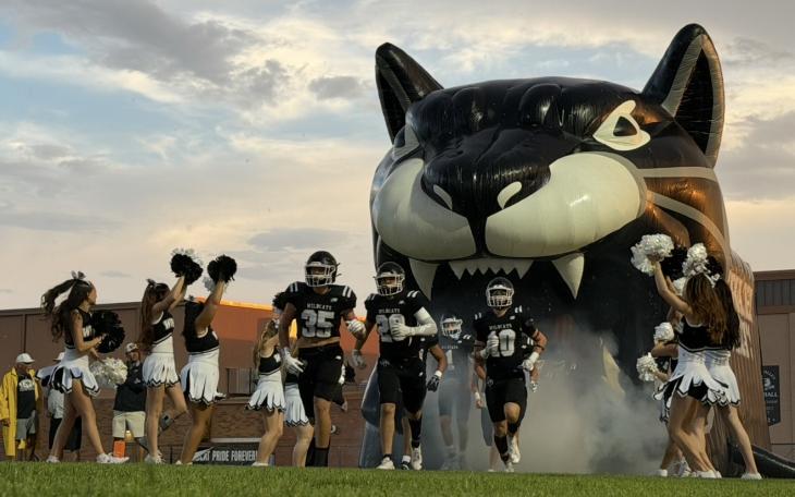 The Water Valley Wildcats run onto the field during the 2026 season.