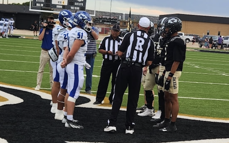 Lake View and Big Spring meet for the coin toss before their game Friday, Sept. 25, 2026.