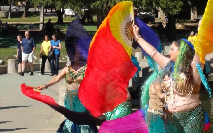 Raks Sanan Mermaids use flags for a colorful display (LIVE! photo by Cheyenne Benson)