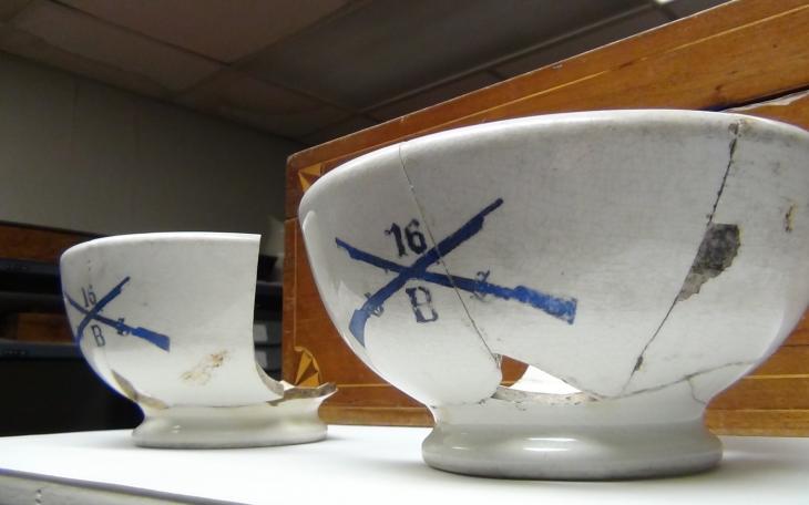 The two bowls were found in the trash dump and pieced together (LIVE! photo by Cheyenne Benson)