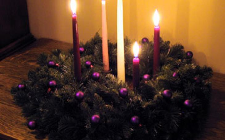 An Advent Wreath lays on a table (photo courtesy of blog.yanceyarrington.com)