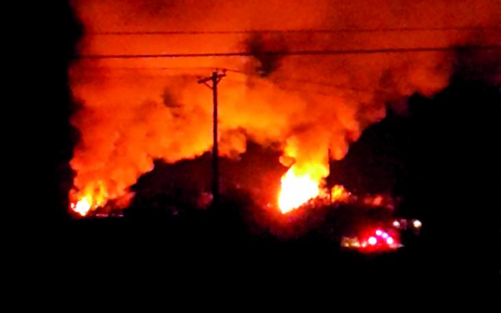 Mysterious fire erupts near location of Sunday's murder-suicide. (LIVE! Photo/John Basquez)