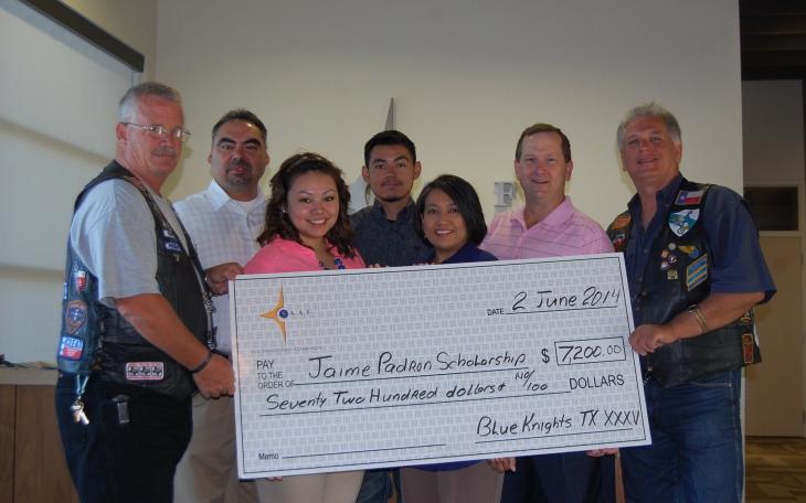 Presenting a check for $7,200 were (L-R): Brian Bylsma, Steve Diaz, Christina Diaz, Steven Diaz, Linda Diaz, Matt Lewis, and Greg Bishop. (LIVE! Photo/Joe Hyde)