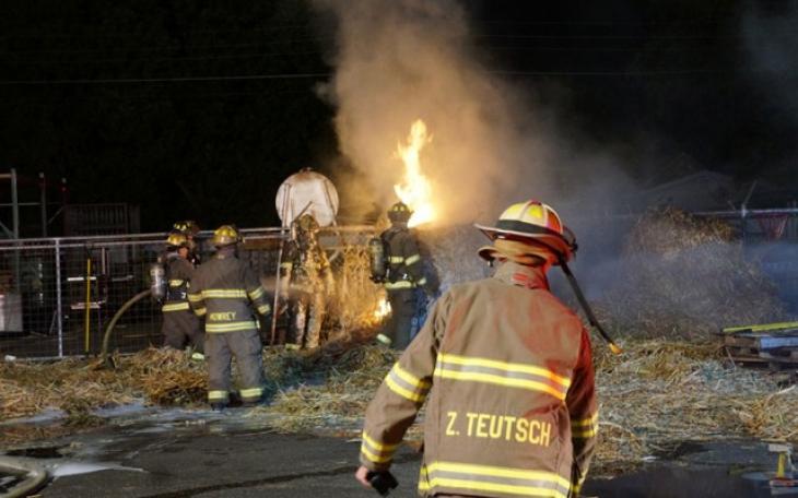Bales of hay caught fire behind Palmer Feed and Supply the night of May 22, 2014 (LIVE! Photo/John Basquez)