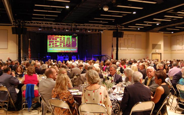 The crowd at the West Texas Rehabs annual Dinner Show anxiously anticipates live act America. (LIVE! Photo by Chelsea Schmid)