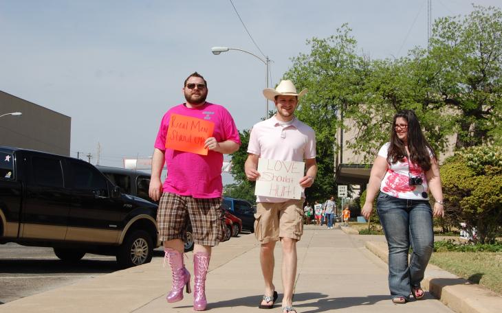 Men paraded around the courthouse Saturday in sparkly boots, pumps and flats to raise awareness for rape and sexual assault. (LIVE! Photo/Chelsea Schmid)