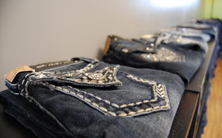 Jeans with plenty of bling on display at So Unique Boutique. (LIVE! Photo by Chelsea Schmid)