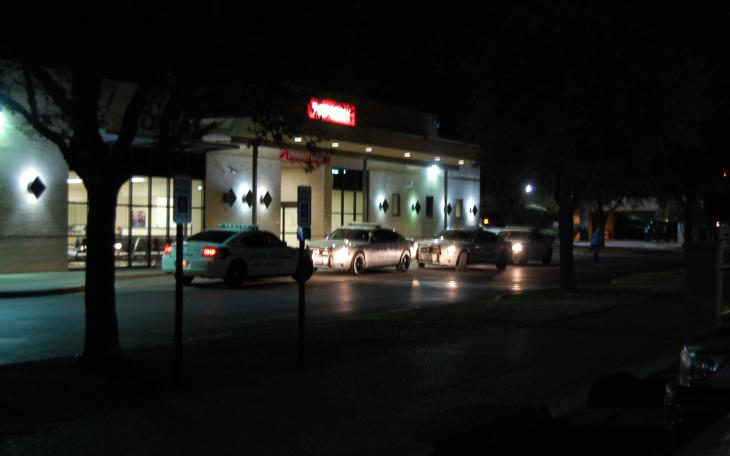 Cop cars line up in front of Community Medical Center Friday night, when an apprehended suspect fled the hospital. (LIVE! Photo by John Basquez)