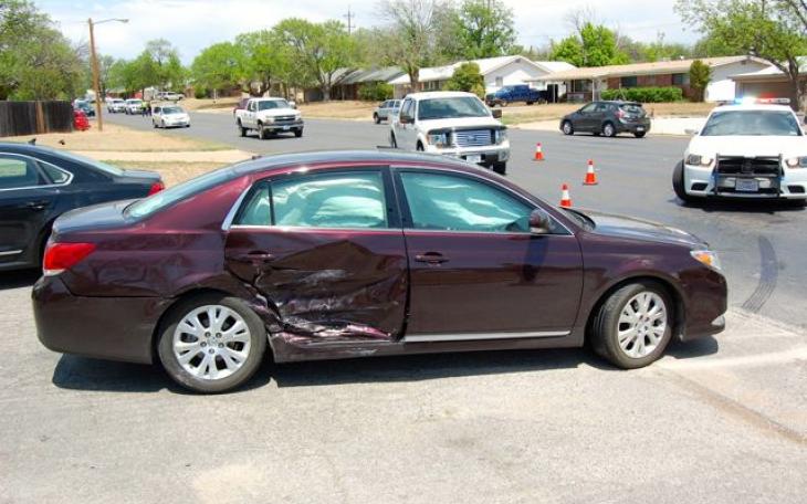 A Toyota Avalon was struck by a Chevy Impala when attempting to turn left from College Hills Dr. Apr. 23, 2014. (LIVE! Photo/Joe Hyde)