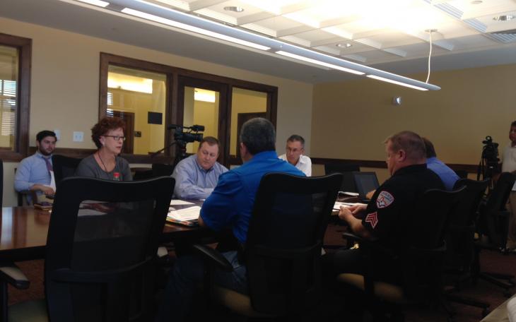 The Meet and Confer team looks over a draft of the contract. (LIVE! Photo/Chelsea Reinhard)