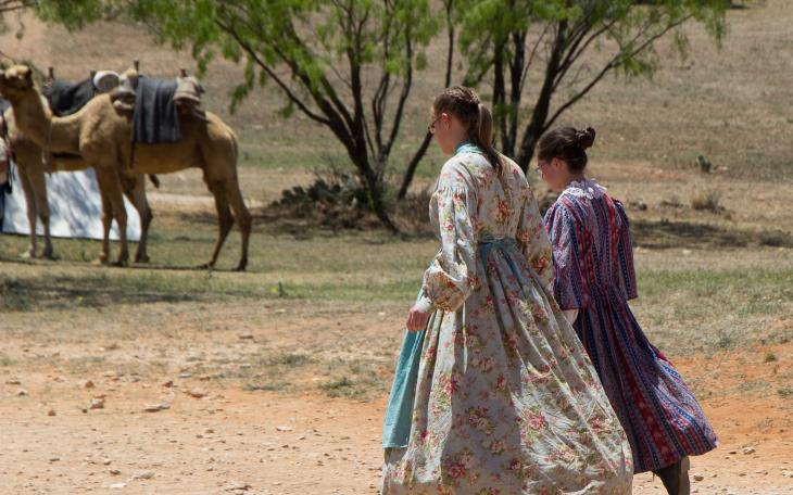 Women in period-accurate dress for the 1800s traverse the ground of Fort Chadbourne Saturday. (Contributed Photo/Amanda Berrie)